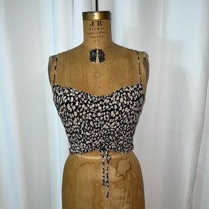 Cute scrunch tank that ties at the bottom!